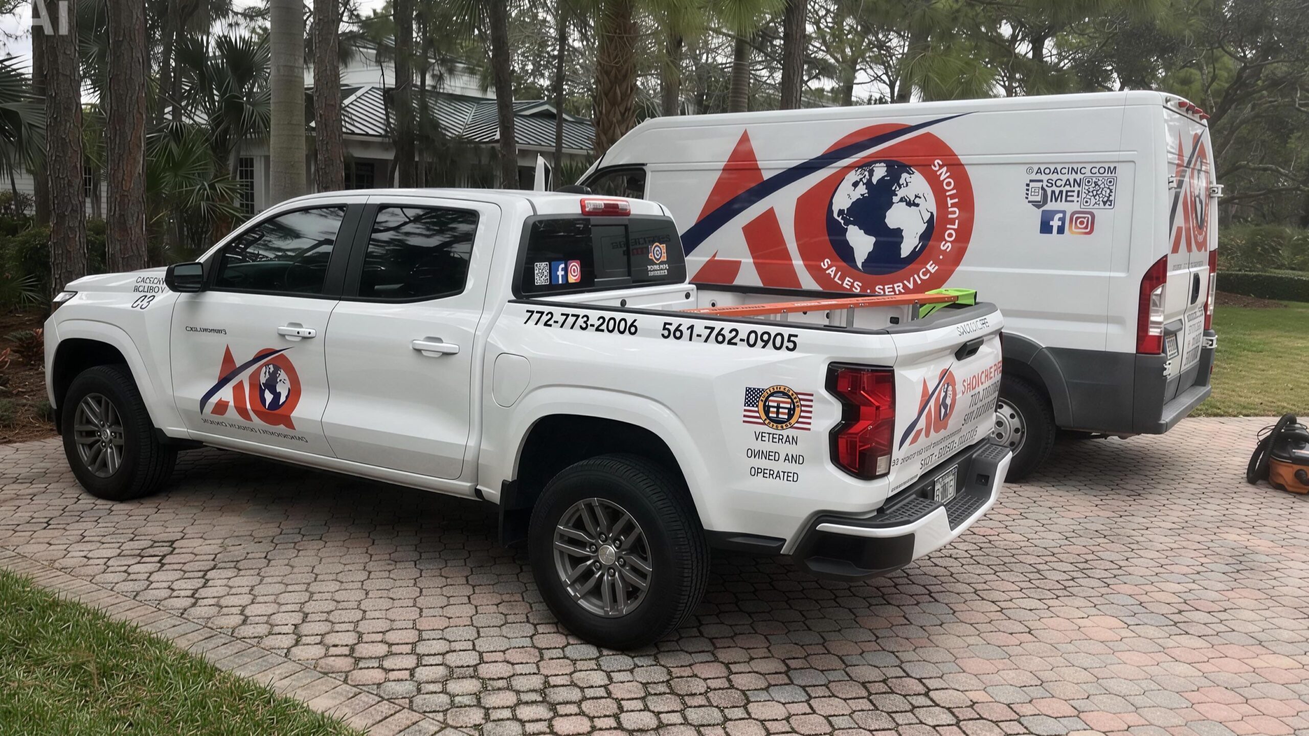 AQ AC & Electric fleet in driveway